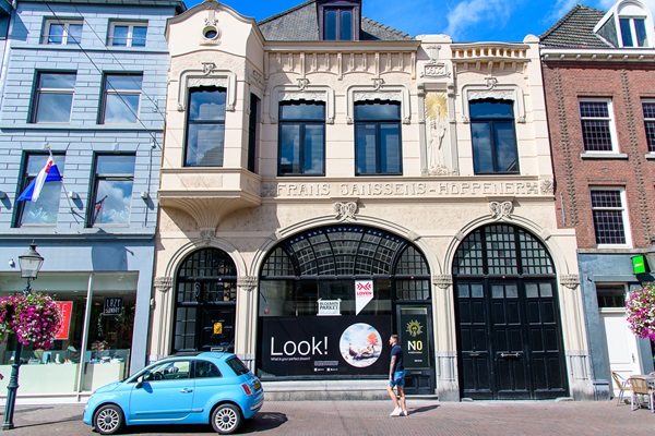Parking in Roermond means that you can park your blue Fiat 500 alongside a shopping street.
